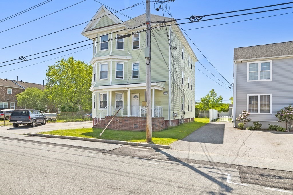 185 Stevens Street Fall River, MA 02721 - Photo 2 of 28 a view of a house with a swimming pool