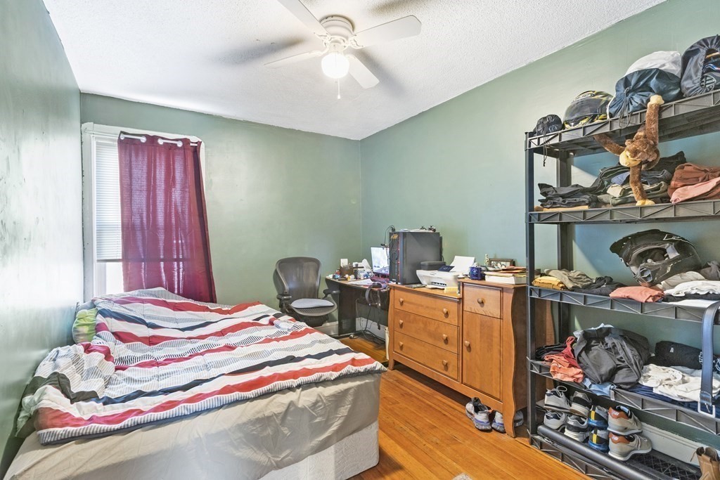 185 Stevens Street Fall River, MA 02721 - Photo 24 of 28 a bedroom with bed and a window