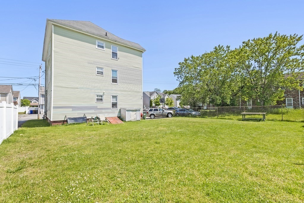 185 Stevens Street Fall River, MA 02721 - Photo 27 of 28 a house view with swimming pool in front of it