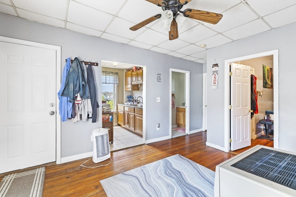 185 Stevens Street Fall River, MA 02721 - Photo 10 of 28 a living room with furniture and a window
