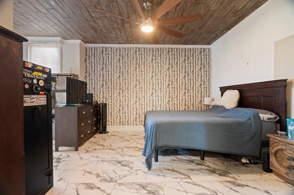 2100 Reflection Bay Drive Arlington, TX 76013 - Photo 10 of 20 a bedroom with a bed and a television