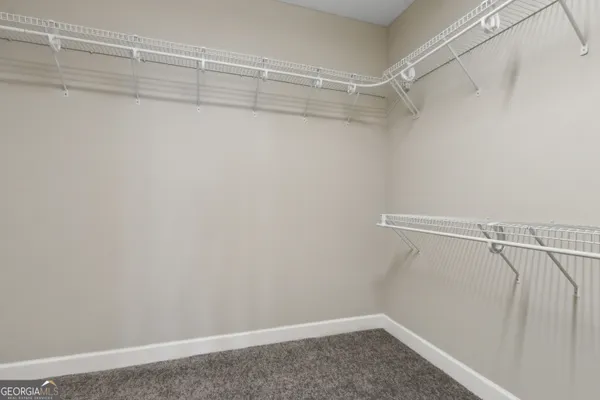 a view of a room with racks on the wall