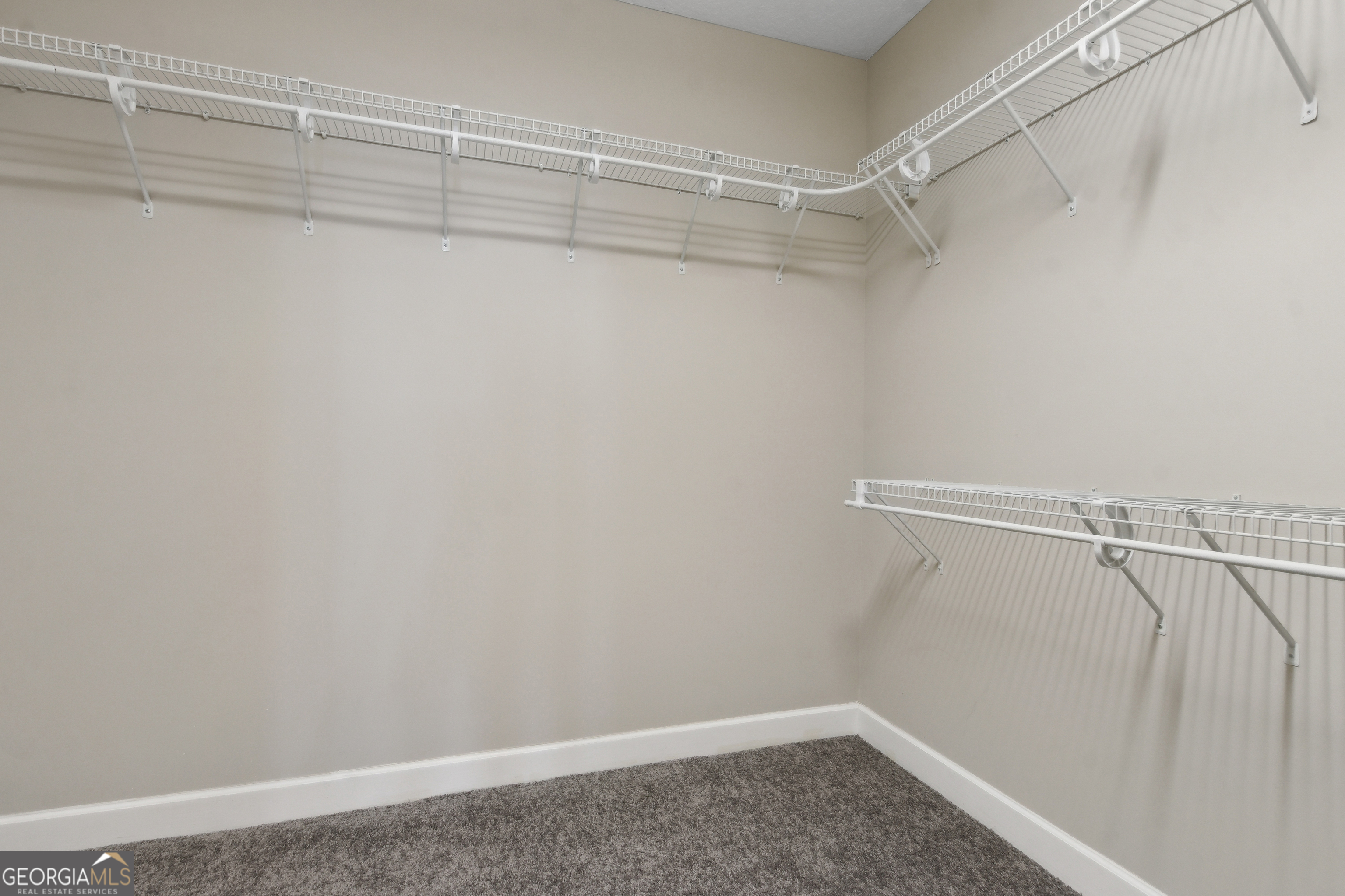 259 Laurel Landing Boulevard Kingsland, GA 31548 - Photo 19 of 43 a view of a room with racks on the wall