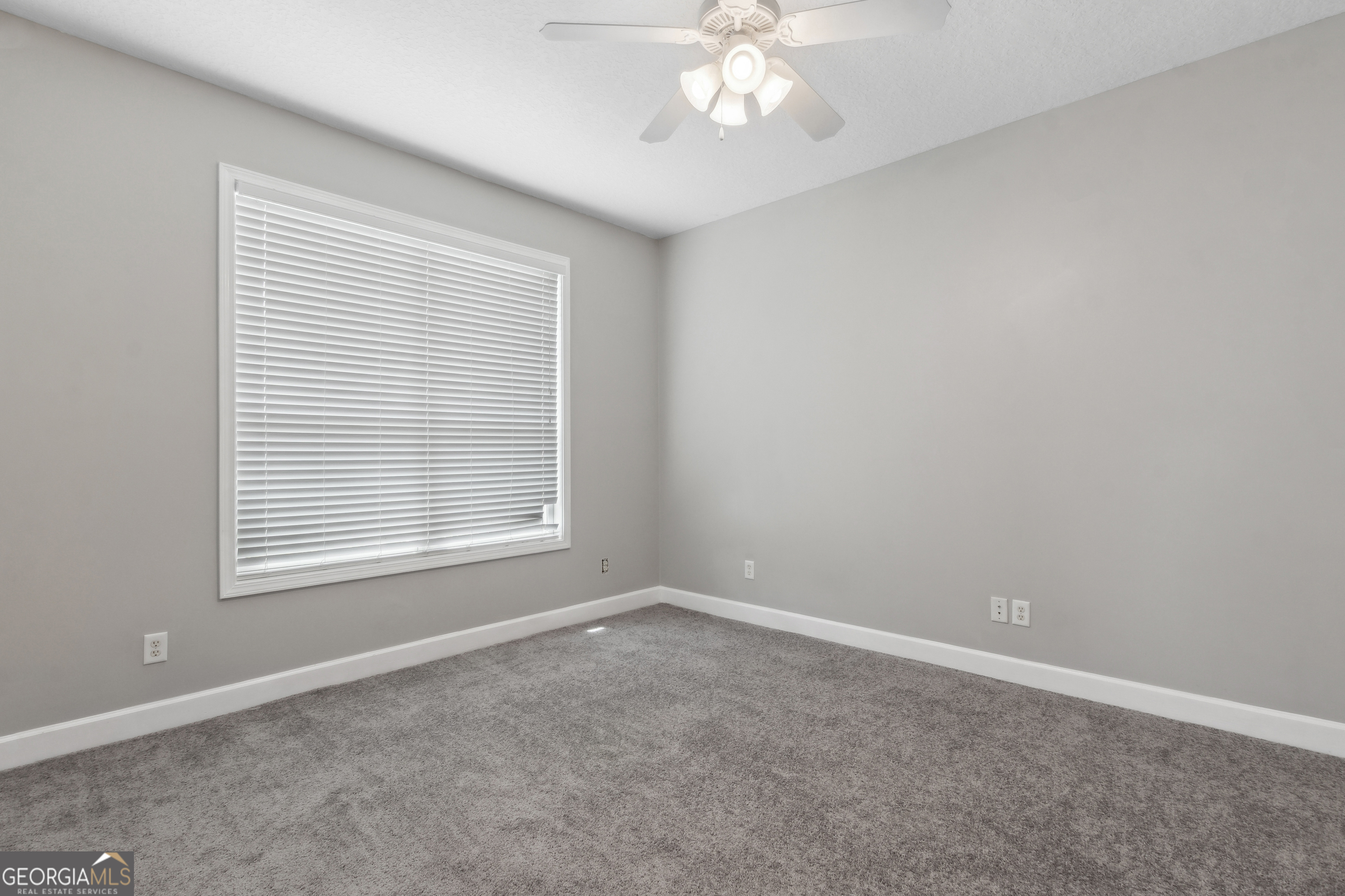 259 Laurel Landing Boulevard Kingsland, GA 31548 - Photo 20 of 43 an empty room with a window