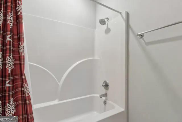 a bathroom with a bathtub