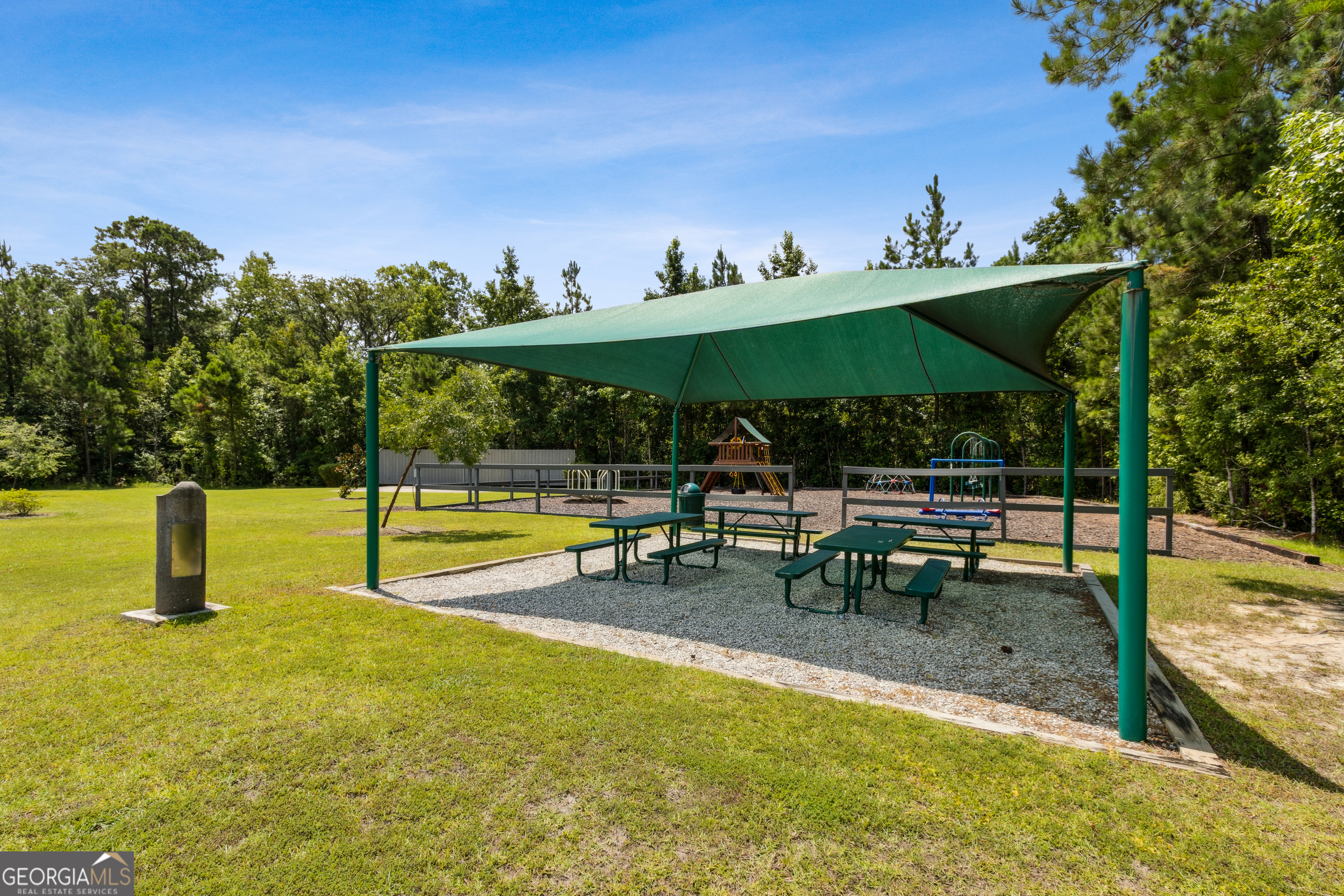 259 Laurel Landing Boulevard Kingsland, GA 31548 - Photo 33 of 43 a view of a swimming pool with a patio