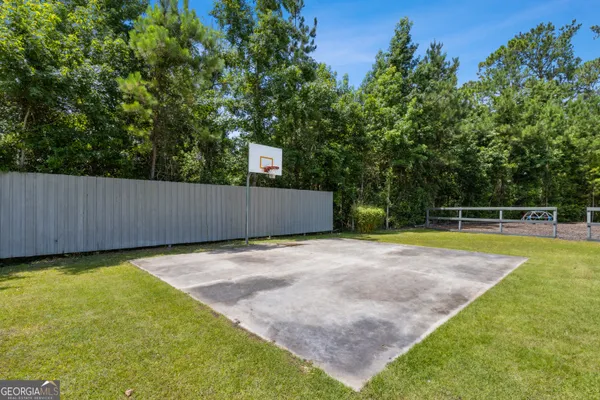 a view of outdoor space with trampoline