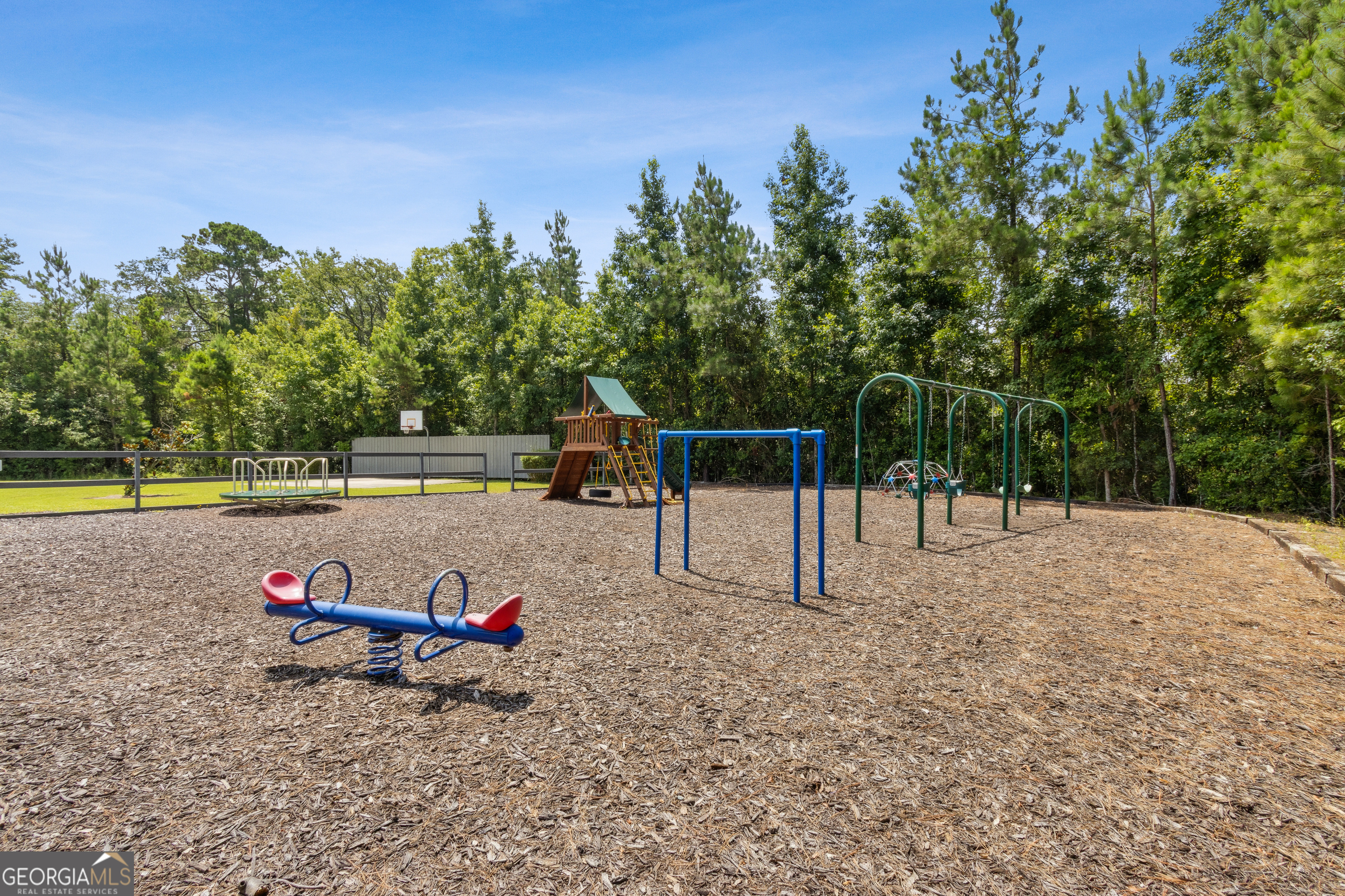 259 Laurel Landing Boulevard Kingsland, GA 31548 - Photo 36 of 43 a view of a park with swings and slides