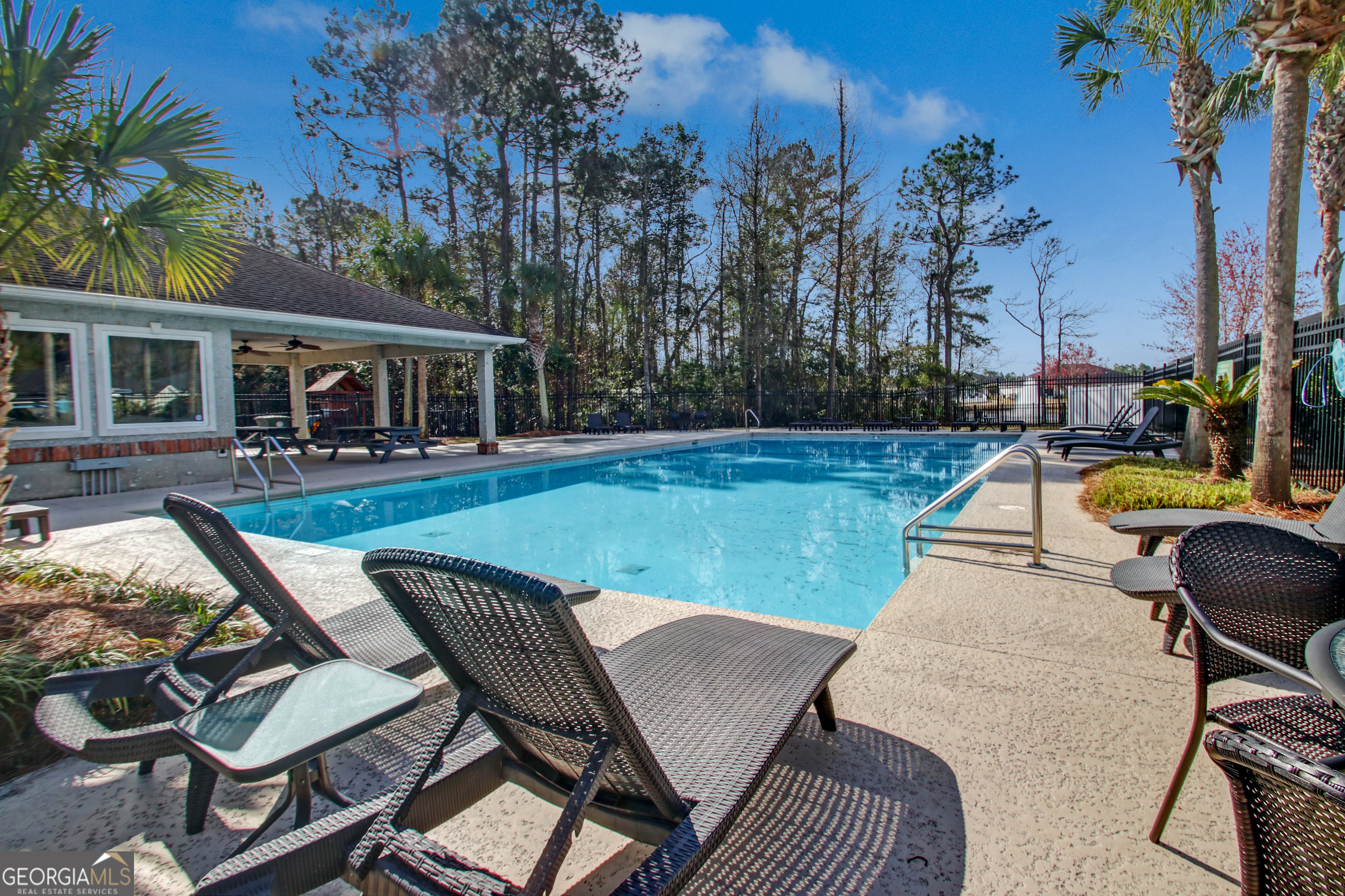 259 Laurel Landing Boulevard Kingsland, GA 31548 - Photo 38 of 43 a view of a yard with furniture and a fire pit