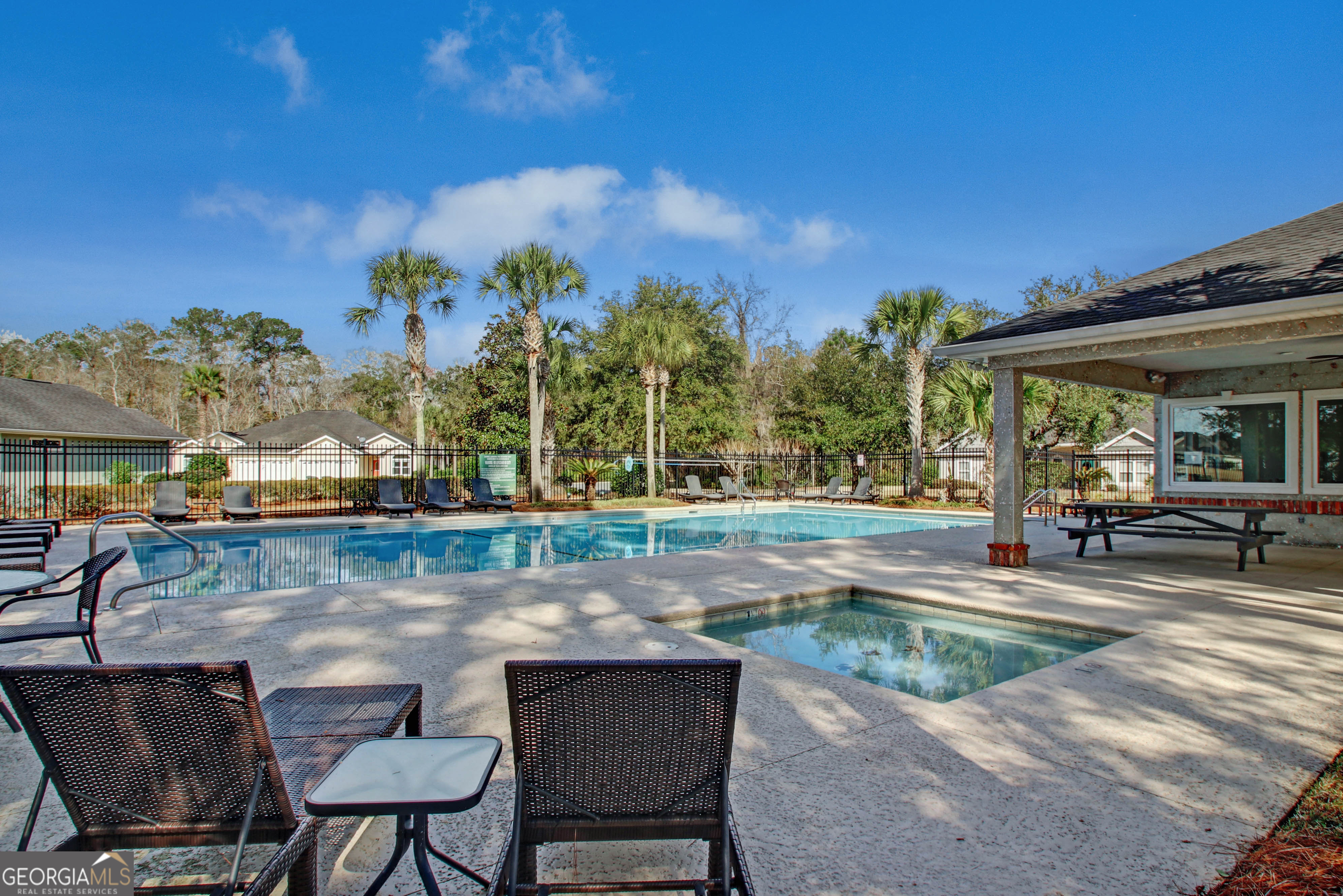 259 Laurel Landing Boulevard Kingsland, GA 31548 - Photo 41 of 43 a swimming pool with outdoor seating and yard