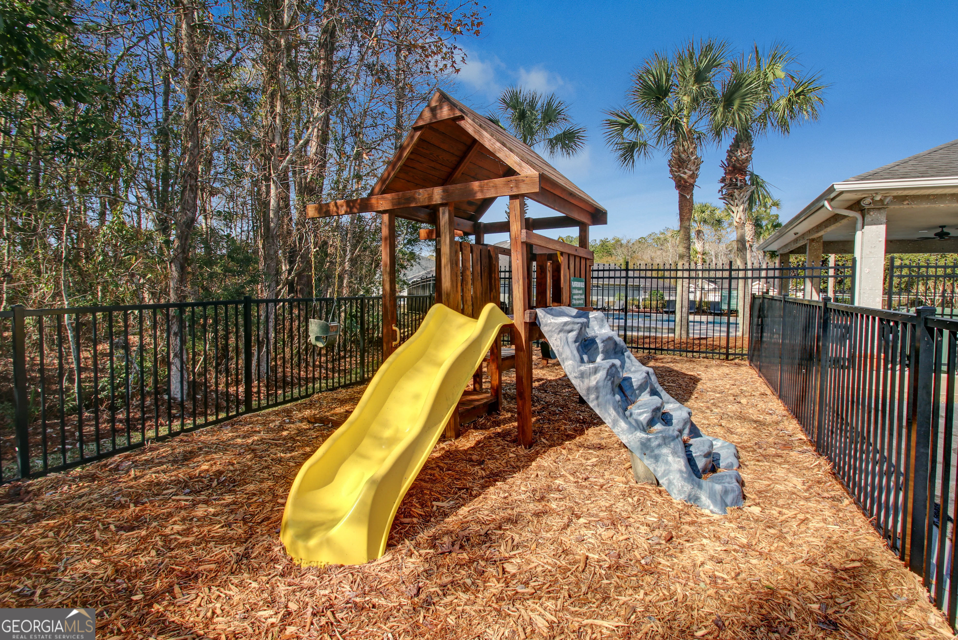 259 Laurel Landing Boulevard Kingsland, GA 31548 - Photo 42 of 43 a view of a house with backyard and swimming pool