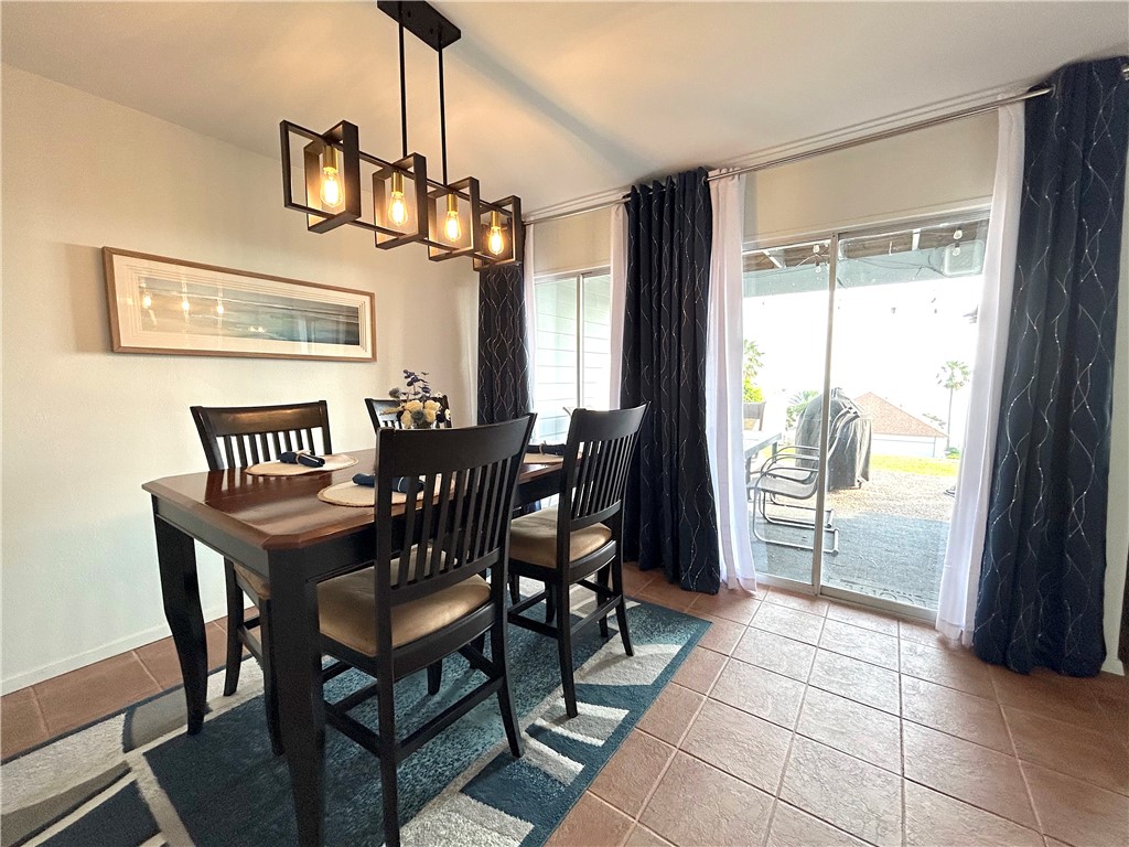 840 Cliff Drive, Unit 4 Portland, TX 78374 - Photo 12 of 32 a view of a dining room with furniture window and outside view