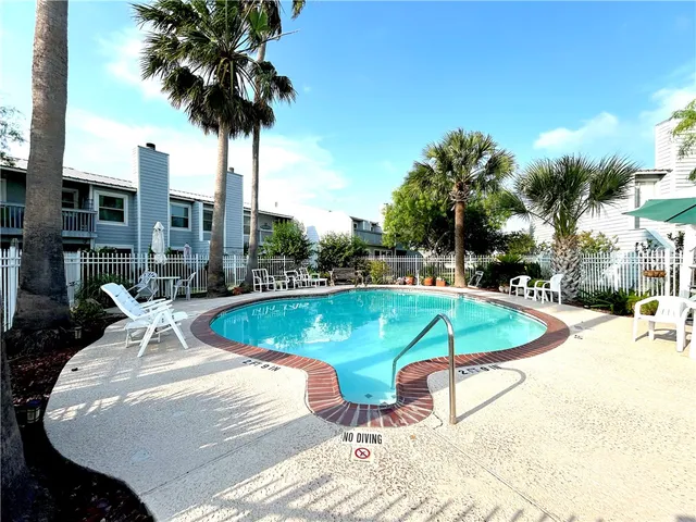 a view of a swimming pool and a terrace