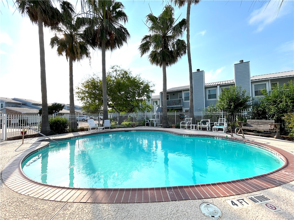 840 Cliff Drive, Unit 4 Portland, TX 78374 - Photo 32 of 32 a view of a swimming pool and a terrace