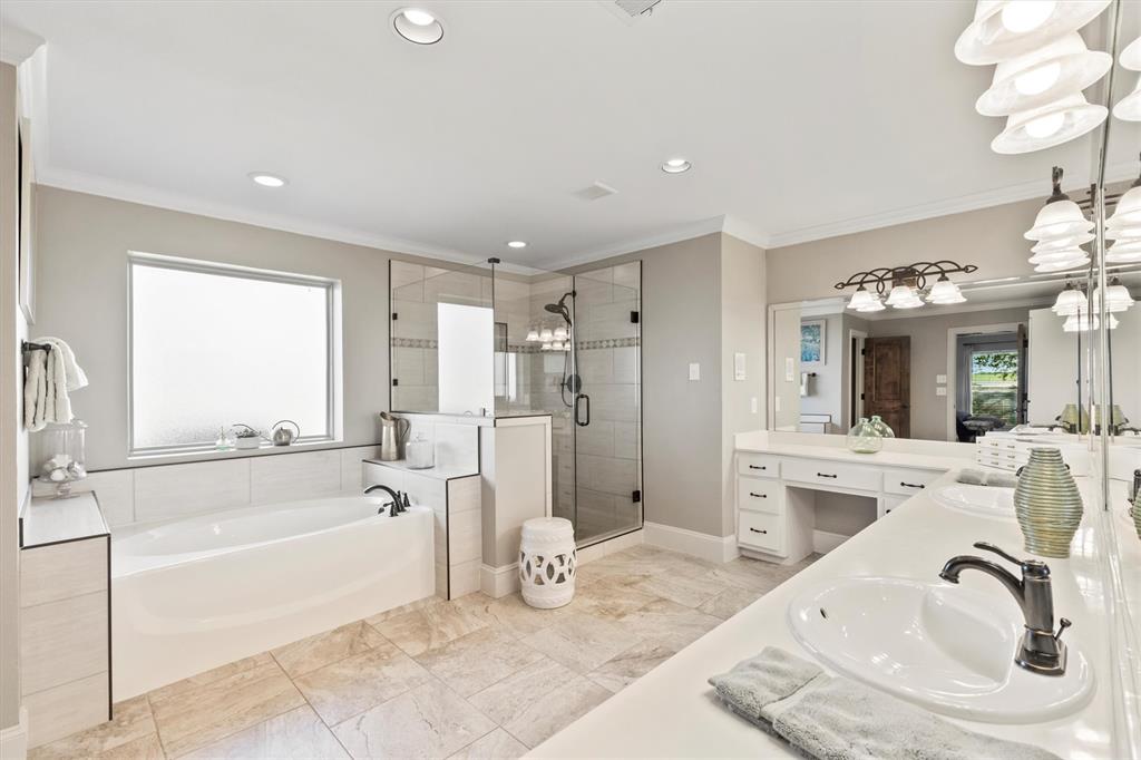 161 Pullen Road McLendon-Chisholm, TX 75032 - Photo 16 of 39 a bathroom with a tub sink and mirror