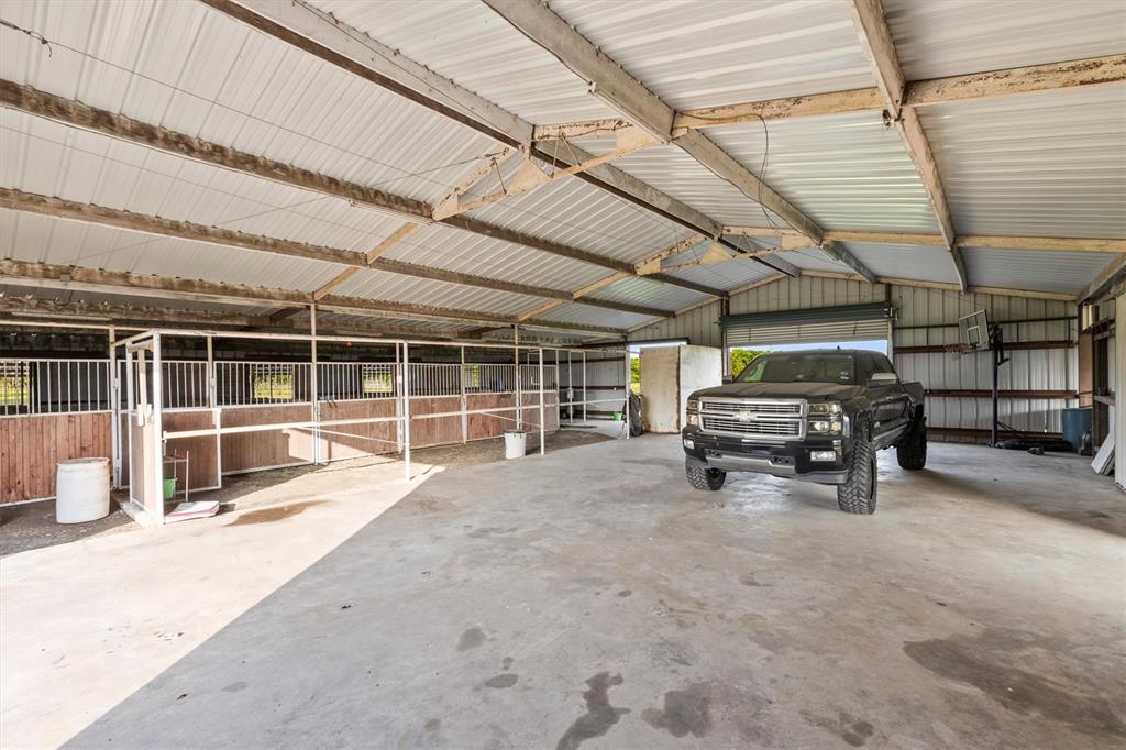161 Pullen Road McLendon-Chisholm, TX 75032 - Photo 33 of 39 a view of a car garage
