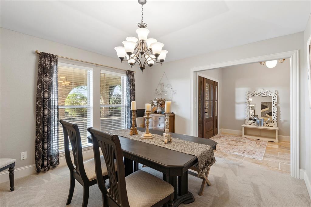 161 Pullen Road McLendon-Chisholm, TX 75032 - Photo 5 of 39 a view of a dining room with furniture window and outside view
