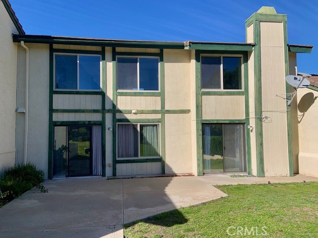 2641 Condor Circle Corona, CA 92882 - Photo 34 of 43 a front view of a house with a yard
