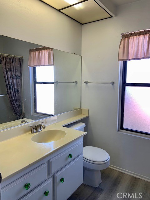 2641 Condor Circle Corona, CA 92882 - Photo 36 of 43 a bathroom with a granite countertop sink toilet and a shower