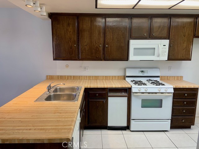 2641 Condor Circle Corona, CA 92882 - Photo 39 of 43 a kitchen with a stove and a cabinets