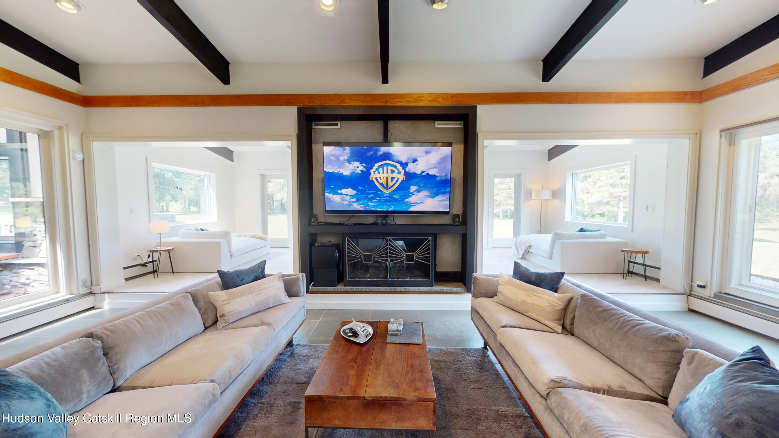 16 Spring Road Hudson, NY 12534 - Photo 12 of 64 a living room with furniture and a fireplace