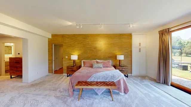 a bathroom with a shower and a sink