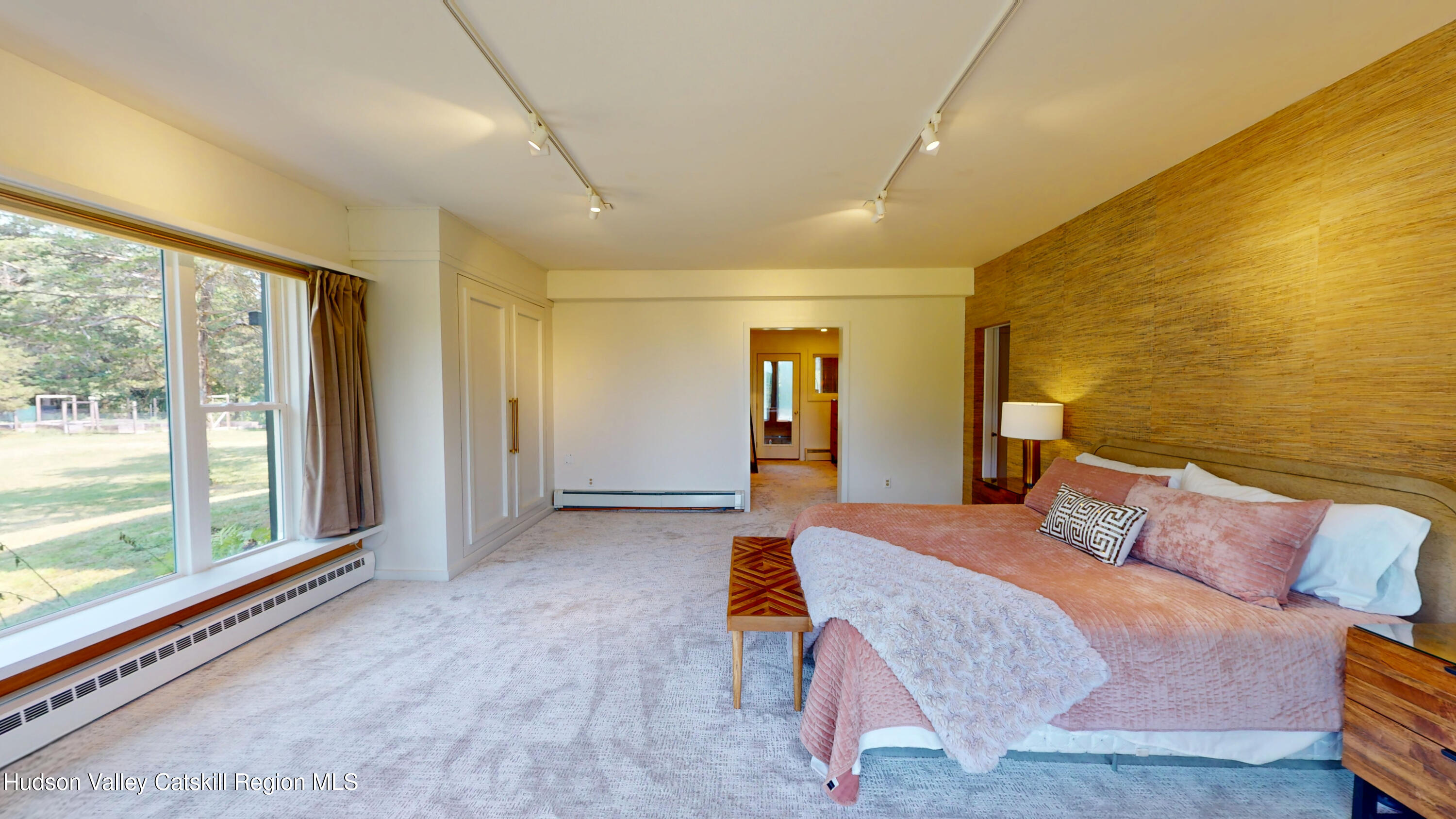 16 Spring Road Hudson, NY 12534 - Photo 31 of 64 a bedroom with a bed and wooden floor