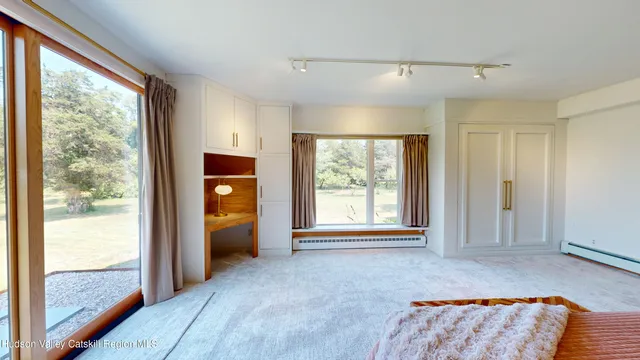 a bathroom with a bathtub and shower