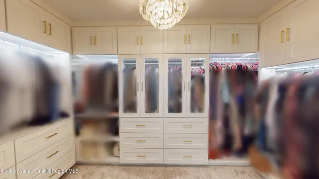 a room with furniture and a large window