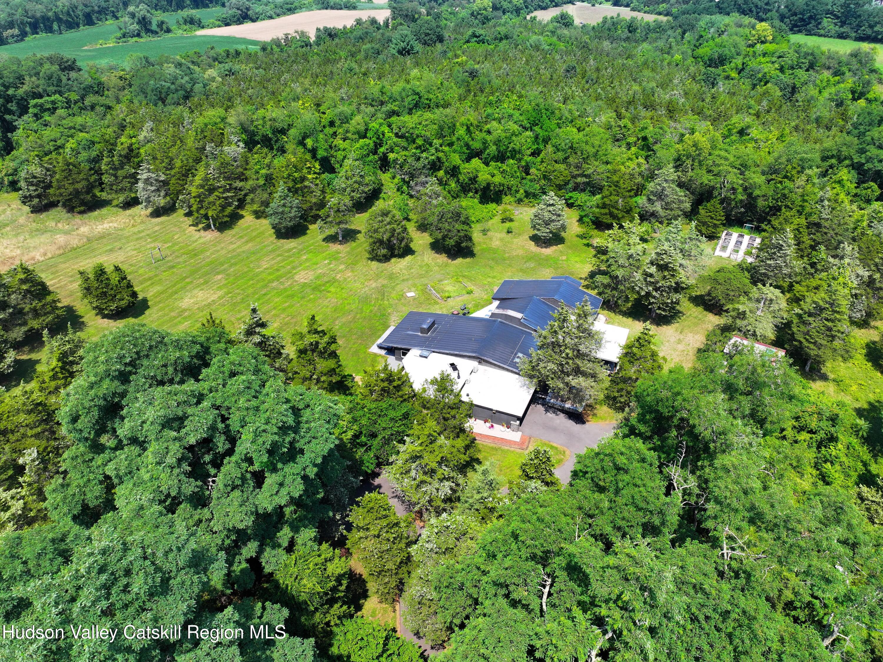 16 Spring Road Hudson, NY 12534 - Photo 55 of 64 an aerial view of residential house with outdoor space and trees all around