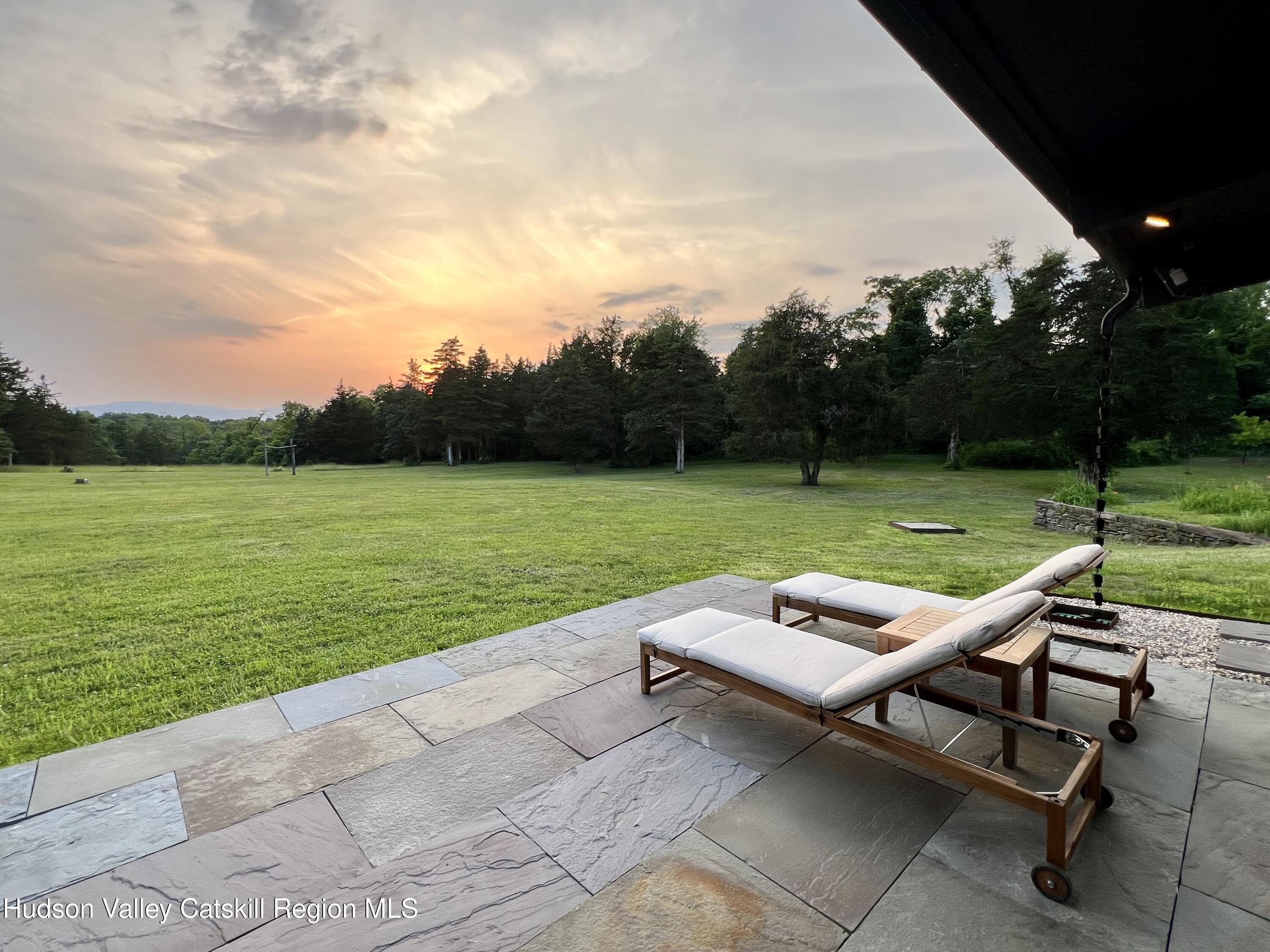 16 Spring Road Hudson, NY 12534 - Photo 59 of 64 a view of a garden with lawn chairs