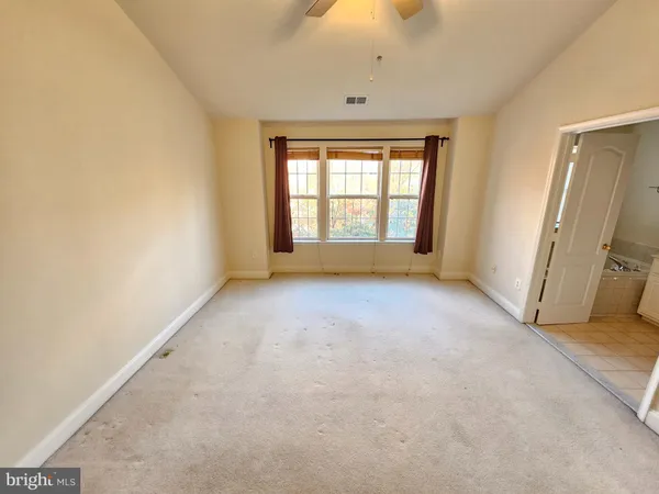 an empty room with windows