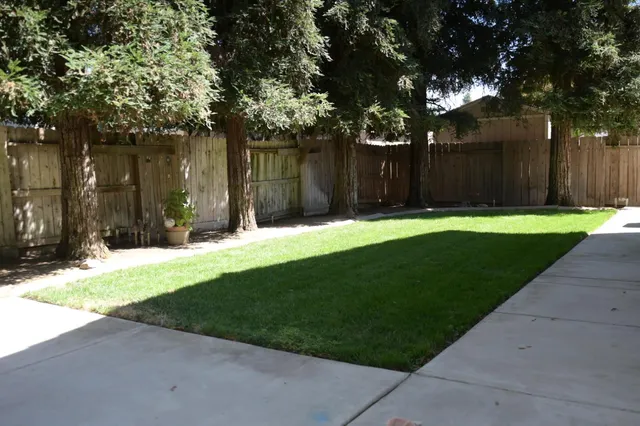 a backyard of house with green space