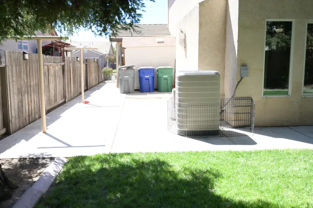 a view of backyard with green space