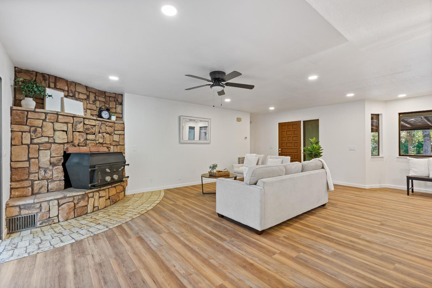 13139 North Meadow View Drive Grass Valley, CA 95945 - Photo 21 of 68 a living room with furniture and a fireplace