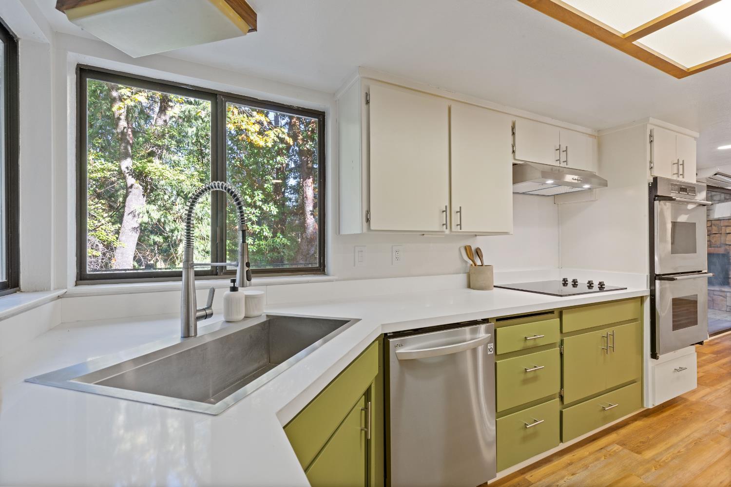 13139 North Meadow View Drive Grass Valley, CA 95945 - Photo 23 of 68 a kitchen with a sink stove and cabinets