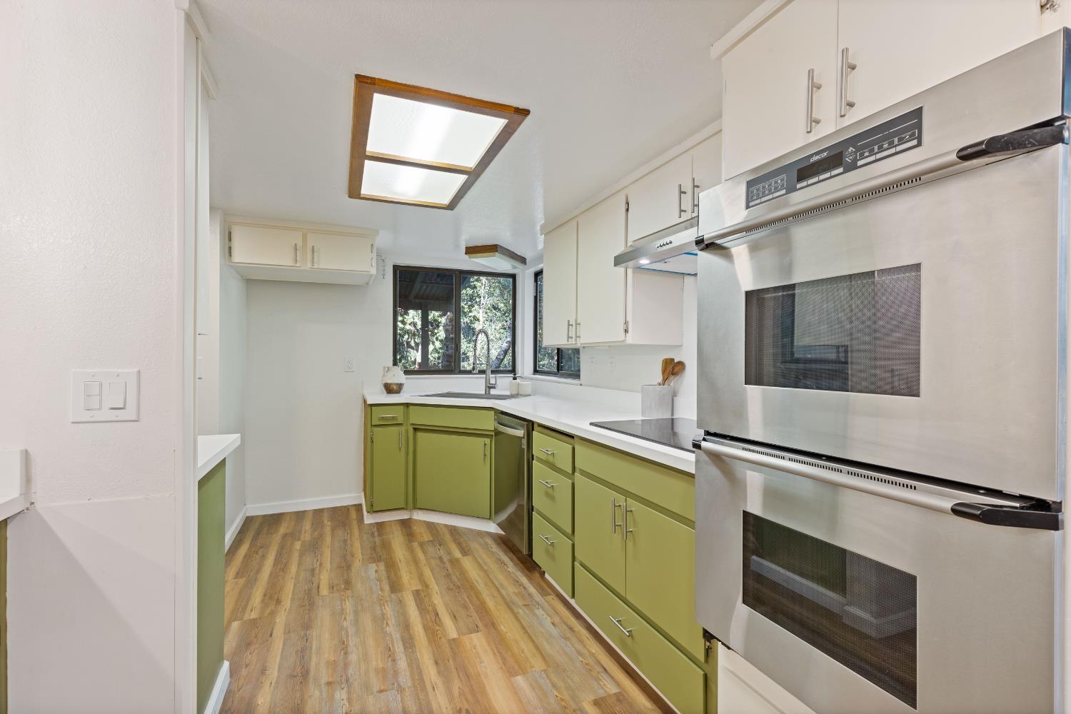 13139 North Meadow View Drive Grass Valley, CA 95945 - Photo 24 of 68 a kitchen with a sink and cabinets