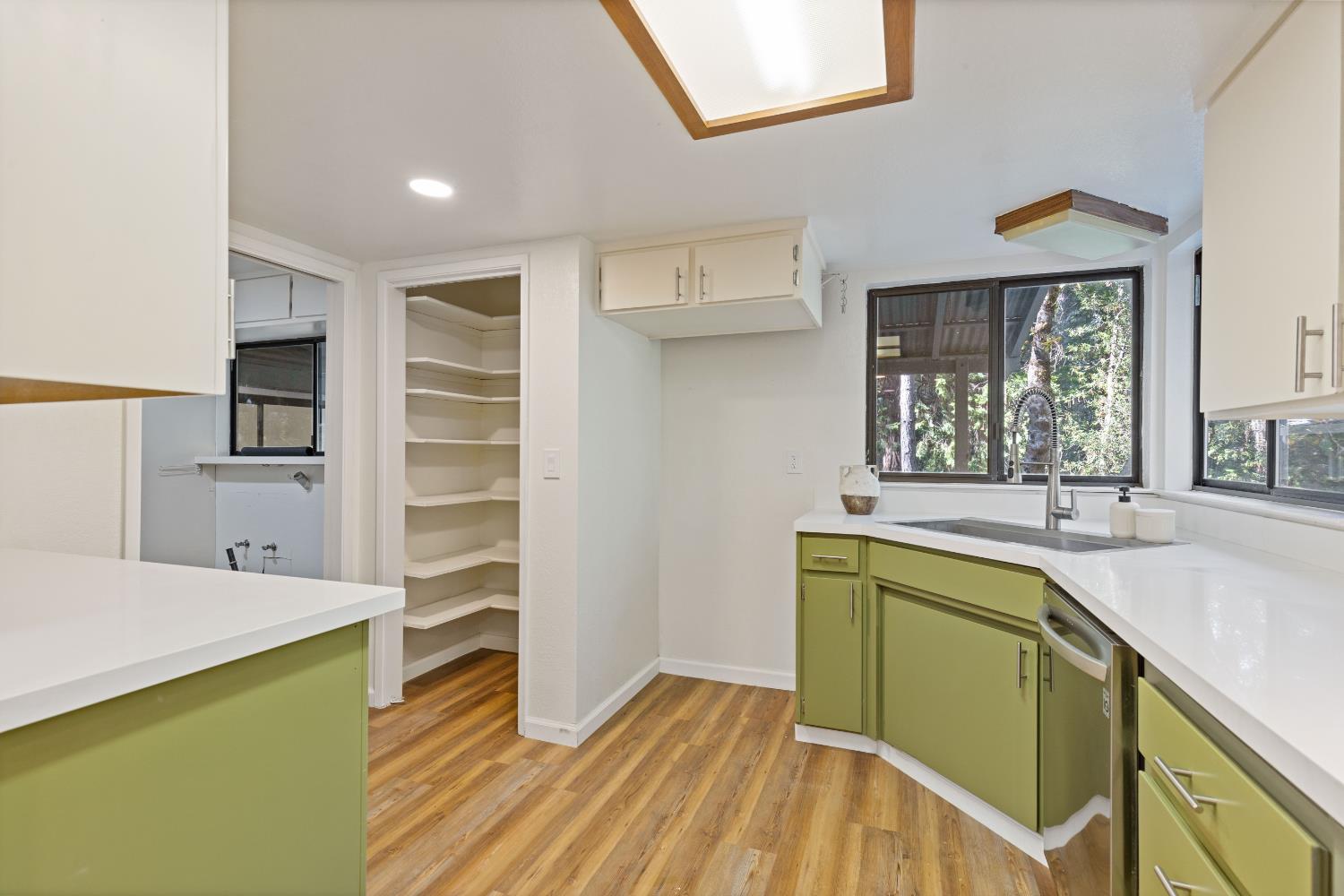13139 North Meadow View Drive Grass Valley, CA 95945 - Photo 25 of 68 walk in closet with window and wooden floor