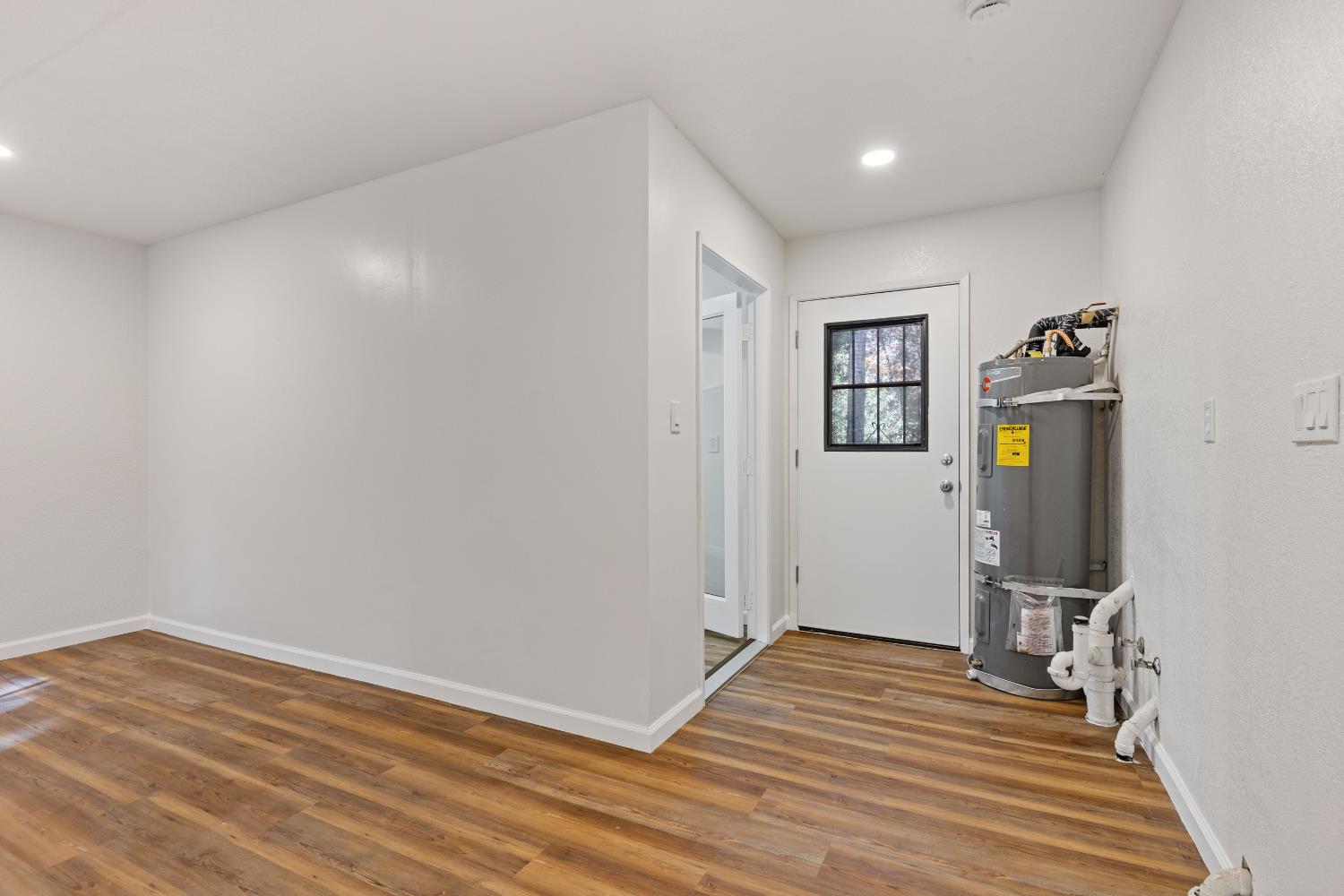 13139 North Meadow View Drive Grass Valley, CA 95945 - Photo 45 of 68 a view of a bedroom with wooden floor and closet