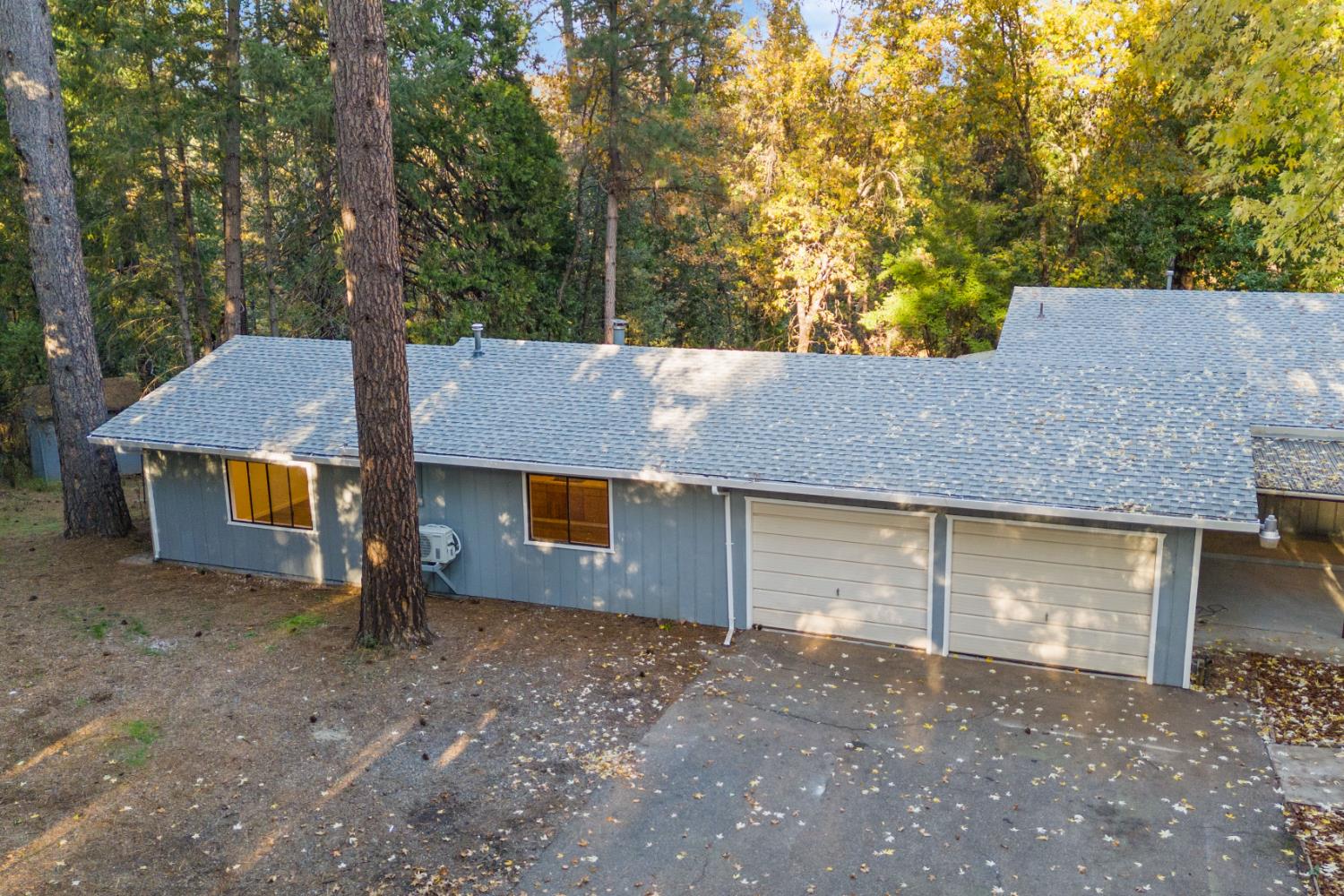 13139 North Meadow View Drive Grass Valley, CA 95945 - Photo 61 of 68 front view of a house with a yard and a large tree