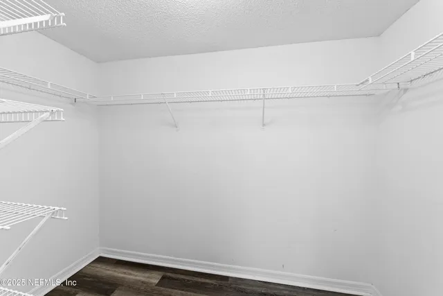 a view of small space with racks on the wall