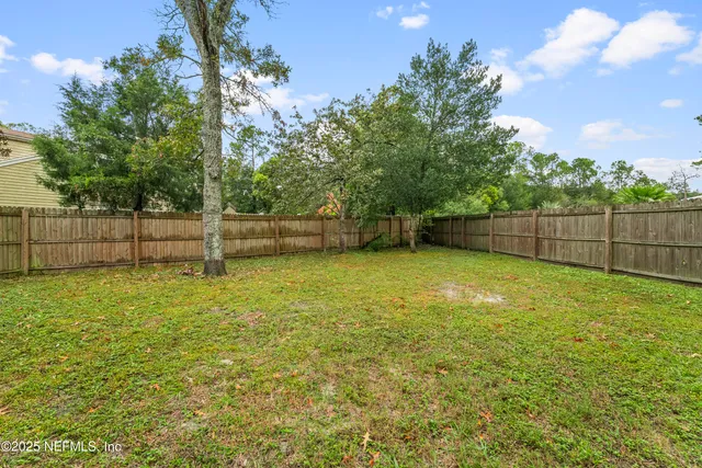 a view of outdoor space and yard