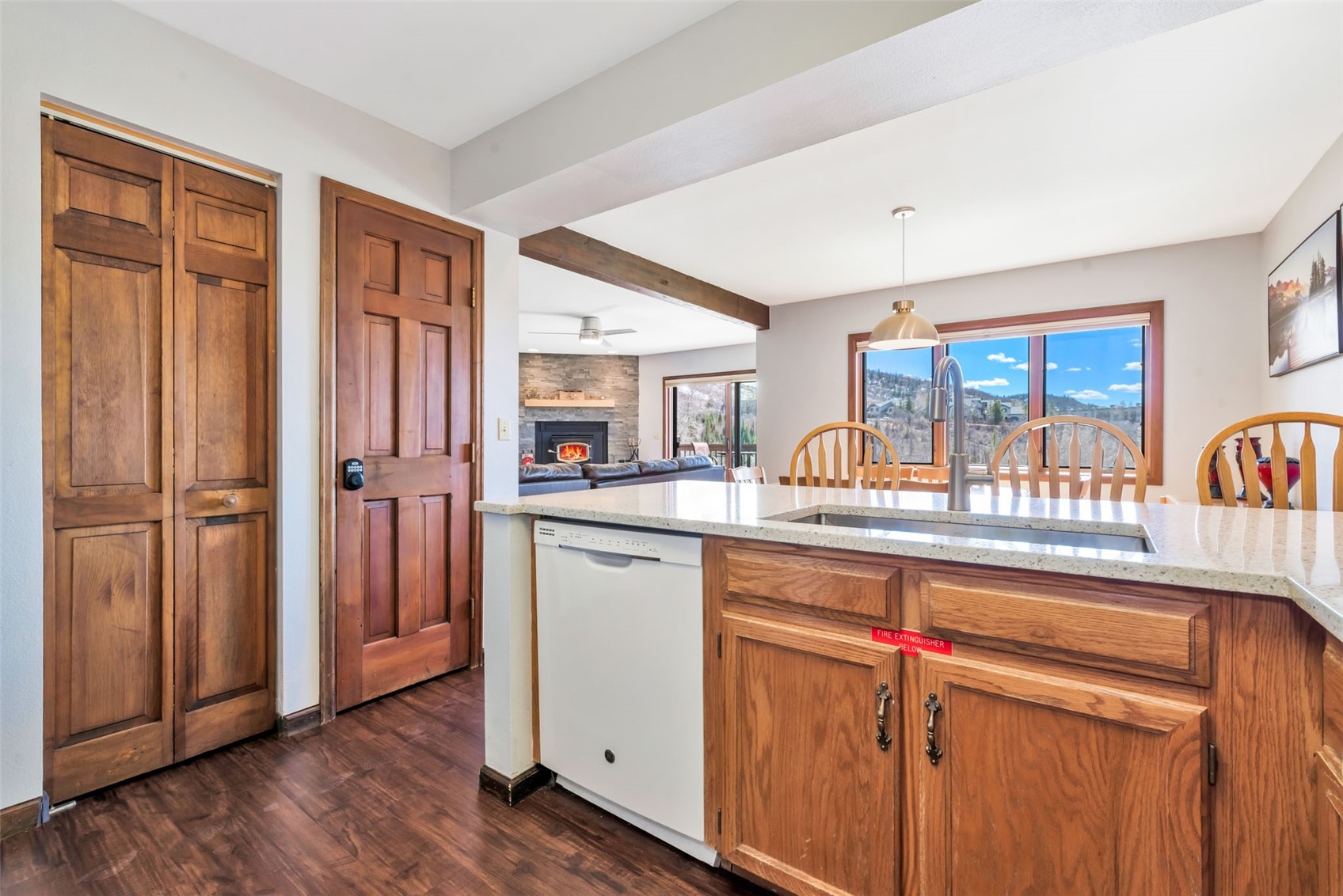 1720 Ranch Road, Unit 309 Steamboat Springs, CO 80487 - Photo 18 of 43 a kitchen with stainless steel appliances granite countertop a refrigerator and a sink