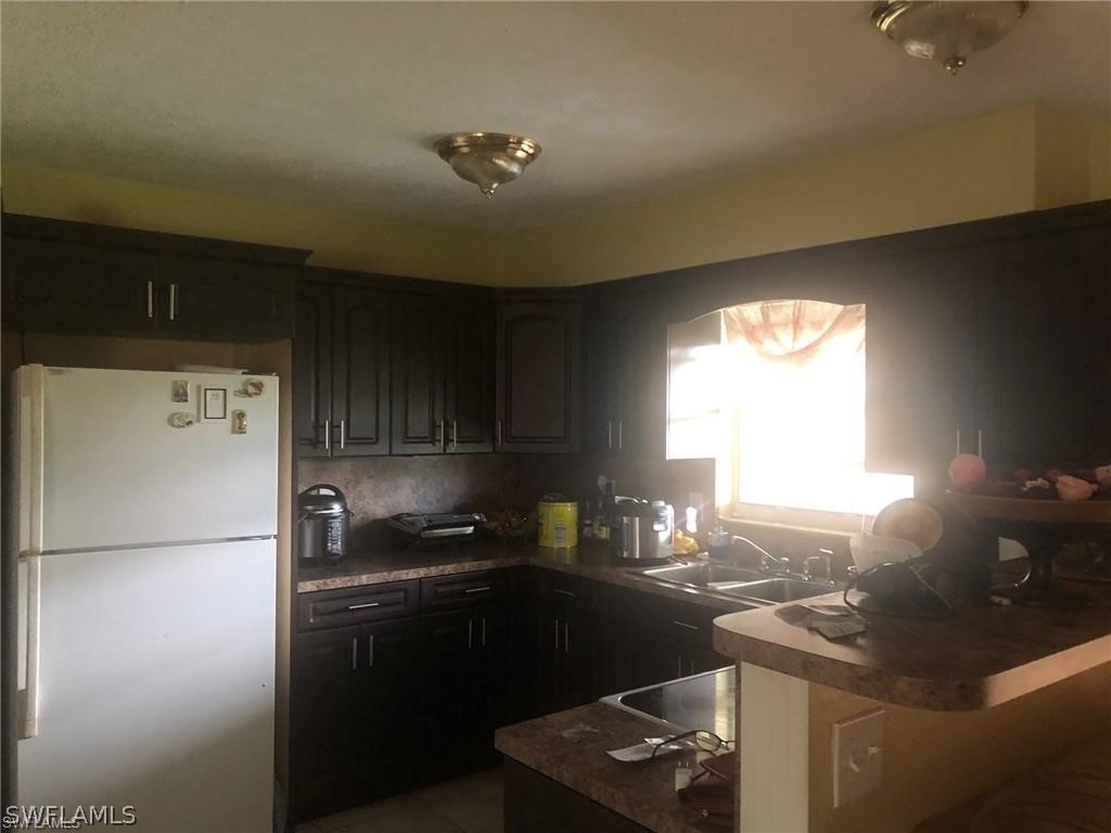 125 Texas Road Lehigh Acres, FL 33936 - Photo 11 of 12 Gallery Image 11