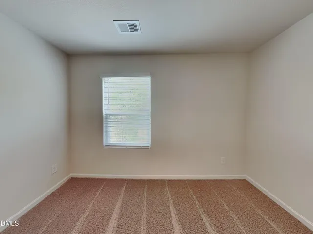 wooden floor and white doors