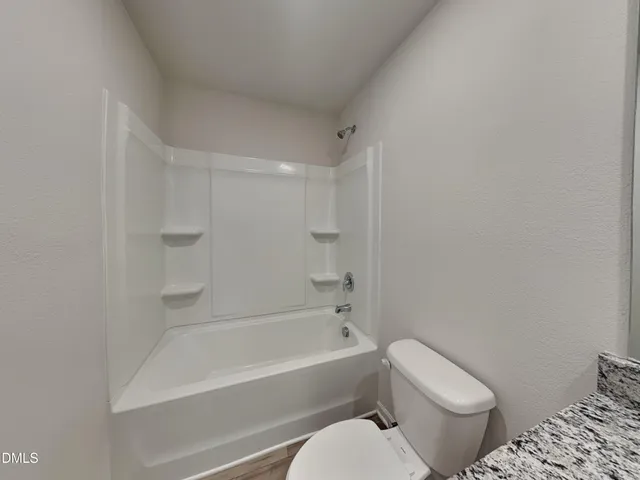 a view of a house with a back yard