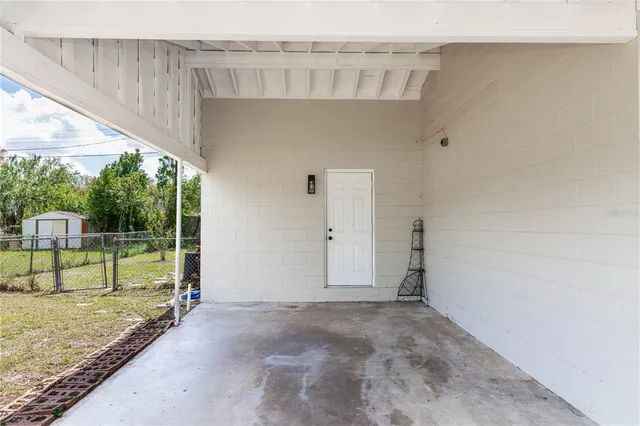 a view of backyard with green space