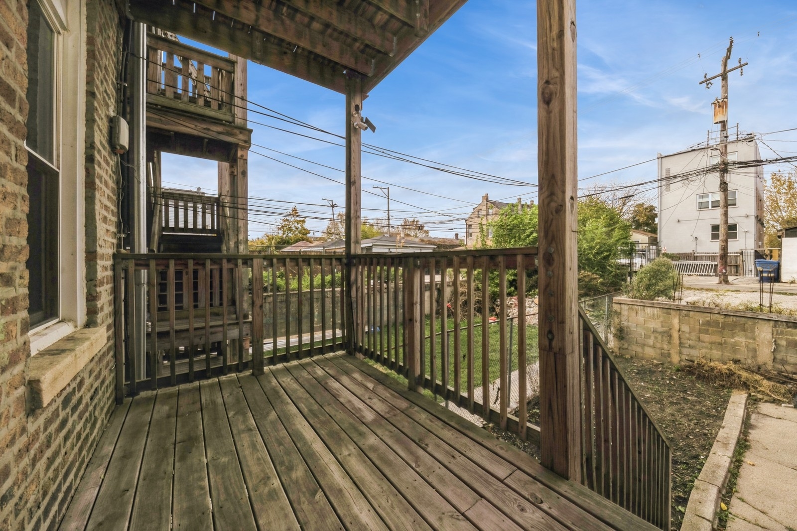 2242 West 19th Street, Unit 1R Chicago, IL 60608 - Photo 12 of 12 a view of a balcony with wooden floor