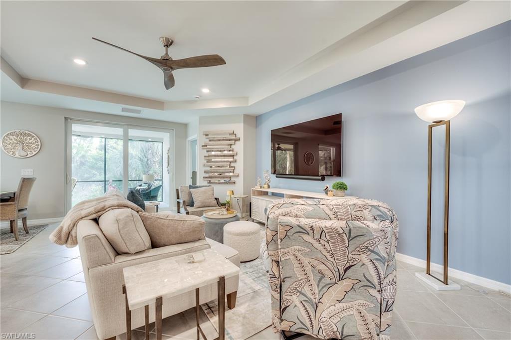 3790 Pebblebrook Ridge Court, Unit 101 Fort Myers, FL 33905 - Photo 11 of 38 a bedroom with furniture and a large window