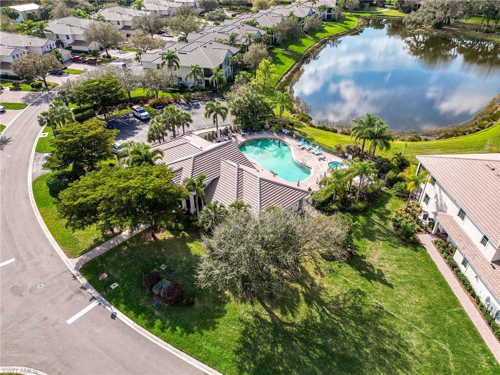 3790 Pebblebrook Ridge Court, Unit 101 Fort Myers, FL 33905 - Photo 8 of 38 an aerial view of a house with a garden and swimming pool